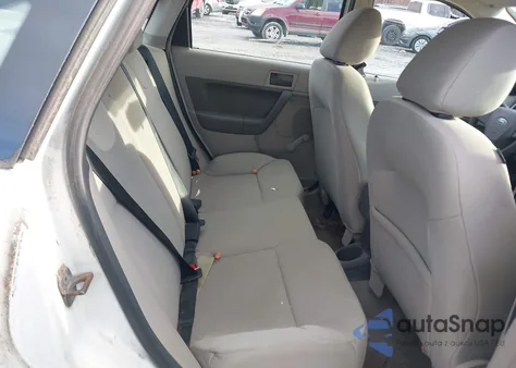 2009 Ford Focus S из США, поврежденный, VIN 1FAHP34N69W118060